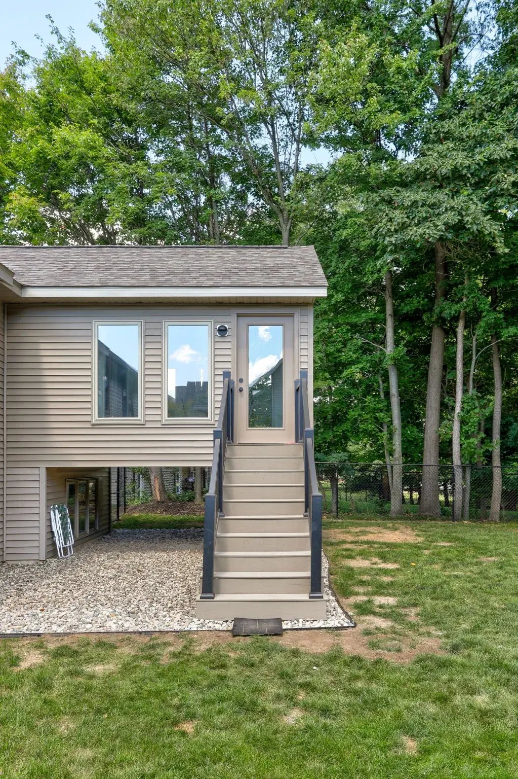four-season addition stairs to yard in Grand Rapids, MI